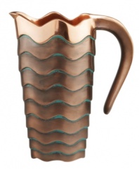 Featuring a bold new look for Nambe's signature metal, the handcrafted Copper Canyon pitcher captures the beauty of the American Southwest in radiant copper with a rippled green patina.