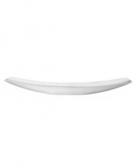 At once graceful and modern, this bowl reflects great taste at every meal. Its long canoe shape, forged in radiant aluminum, makes a chic presentation of bread, appetizers and salads. From Dansk's collection of serveware and serving dishes.