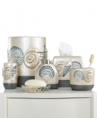 Life's a beach! Charm your bathroom in a look of seaside-inspired beauty with this Hampton Shells tissue holder, featuring eclectic seashells in tan and blue tones for a calming appeal.