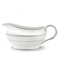This elegant sauce boat is accented with a delicate flourish of vine-like, white-on-white imprints with raised, iridescent enamel dots. Holds 16 oz. 9 long. From Lenox's dinnerware and dishes collection. Qualifies for Rebate