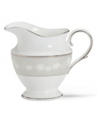 Get set for coffee and dessert. This elegant bone china creamer completes your course with a delicate floral design with textured white beads and elegant platinum trim. From Lenox's dinnerware and dishes collection. Qualifies for Rebate
