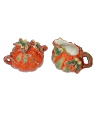 Ready your table for the harvest season. Spode's serveware and serving dishes collection honors fall's most famous squash with this pumpkin sugar and creamer set, a beautiful addition to autumnal feasts and fresh companion to the classic Woodland dinnerware collection. (Clearance)