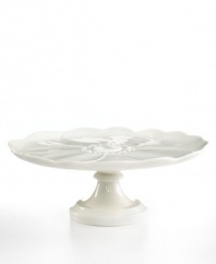 Beautifully formed anemone petals in white porcelain make this figural cake stand from Martha Stewart Collection a charming way to refresh your favorite confections.