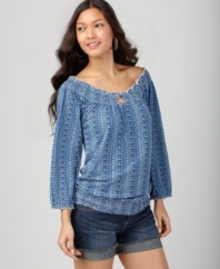 The classic Mena shirt from Lucky Brand Jeans gets revamped with a cool Moroccan-inspired print. The smocked scoop neckline lets you show a little shoulder when the weather warms up!