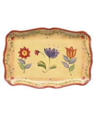A Tuscan-inspired pattern with warm, sun-drenched colors and scalloped edges gives this platter an old-world feel. From Pfaltzgraff's dinnerware and dishes collection.