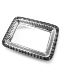 The ultimate in style and convenience, the lustrous Flutes and Pearls rectangular tray from Wilton Armetale's collection of serveware and serving dishes retains food temperature and carries meals from the oven, stove or grill, straight to your table.