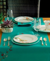 This Chirp placemat offers a whimsical approach to fine dining. Silky fabric in vibrant turquoise is embroidered with watercolor-inspired birds and florals that make any meal sing.