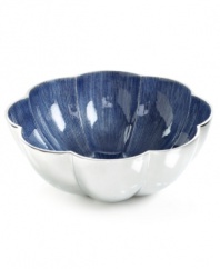 More than conversation blossoms around your table with the handcrafted Parisian Blue Lotus bowl from Simply Designz. Polished aluminum lined in glossy enamel lends fresh color and shine to any dining area.