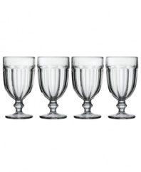 Just calling for lemonade, sweet tea or a big scoop of strawberry ice cream, this set of versatile iced beverage drinking glasses tops casual tables with vintage charm. Featuring a fluted, footed design in clear glass.
