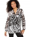 Into the wild! Style&co.'s zebra-print tunic has a graphic look that pairs perfectly with jeans and leggings.