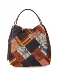 Peace, love and fashion- Channel your inner indie goddess with this Lucky Brand patchwork hobo. Leather tassels and a slouchy body make this bag perfect for relaxed weekend style.