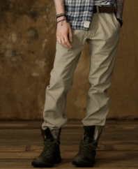 A crisp cotton twill chino pant earns its rank as a go-to favorite with subtle vintage fraying and a slim fit.