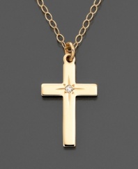 A lovely and meaningful gift, this 14k gold dainty cross pendant features a pretty diamond accent.