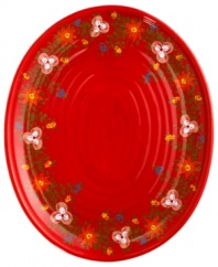 Very crafty. The bold red Pasha oval platter appeals with a homespun look and feel in organically shaped, artfully hand-painted earthenware from Tabletops Unlimited. With a hidden design on its base.