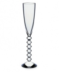 Baccarat redefines bold with the statuesque Vega flute. Premium crystal balancing a clear bowl and chunky, beaded stem exudes chic luxury in any setting.