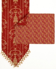 Prepare your table for an elegant meal with the Vase placemat, featuring an allover swirling floral pattern in dramatic red and gold hues.