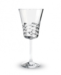 Classic technique, modern beauty. Crafted of fine Baccarat crystal, the Lola red wine glass pairs horizontal wedge cuts with a simply luminous base in a silhouette that radiates grace and sophistication.