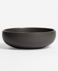 With a powdery matte finish and clean modern shapes, this dinnerware collection from renowned designer Vera Wang brings minimalism to the table with chic style. In soft, natural graphite, this soup/cereal bowl coordinates perfectly with any decor.