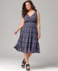 An ultra-flattering A-line shape elegantly outlines Style&co.'s sleeveless plus size dress, featuring a tiered skirt-- wear it from day to date night!
