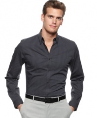 Upgrade your style with a sleek slim-fit woven shirt from Calvin Klein.