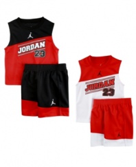 He'll be the air apparent on the court with the sporty style of this Nike Jordan shirt and shorts set.