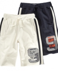 Wade in. He'll be ready to get his feet wet in these laid-back graphic shorts from Industry 9.