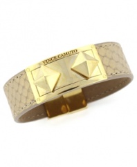It's a wrap! Vince Camuto combines a natural-colored pearl leather band with a trendy pyramid-studded magnetic clasp that snaps into place. Clasp crafted in gold plated mixed metal. Approximate length: 7 inches. Approximate width: 3/4 inch.