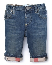 Stylishly laid-back little ones will look darling in these denim trousers from Burberry.