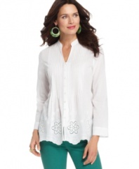 A linen tunic gets a feminine touch with a scalloped hem and eyelet embroidery, from Charter Club. Pair it with vibrant jeans for a classic look with an unexpected twist!