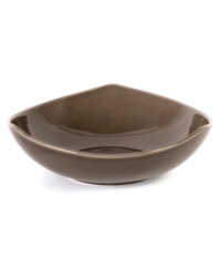 Inspired by an iconic Nambe design, this sculptural vegetable bowl features three gentle points in sleek, sturdy stoneware and a sophisticated espresso hue. An essential part of the Tri-Corner dinnerware collection.
