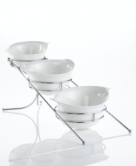 These Natura bowls from Godinger's collection of serveware and serving dishes combine elegant white porcelain with chrome racks, ensuring your table is beautiful but protected. Handles make things easier for the host.