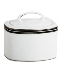 In the hands of kate spade, black and white is anything but basic. Dancing ebony stitched stripes provide a stunning contrast to the pristine china of the Union Street covered sugar bowl (shown front right).