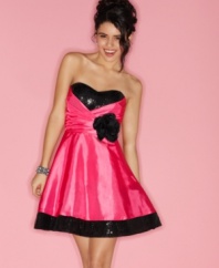 Be the life of the party in this taffeta dress from Roberta that flaunts a fluid a-line shape and sequins galore!