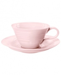 Celebrated chef and writer Sophie Conran introduces ultra-durable dinnerware designed for every step of the meal. A ribbed texture gives this pink Portmeirion cup and saucer set the charm of traditional hand-thrown pottery.