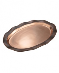 Featuring a bold new look for Nambe's signature metal, the handcrafted Copper Canyon oval platter captures the beauty of the American Southwest in radiant copper with a rippled green patina.