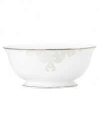 Refine your formal table with classic cream and white Lenox dinnerware. Dishes, including this Opal Innocence Scroll bone china serving bowl, are trimmed in platinum and accented with a raised dot and scroll pattern, bringing contemporary grace to special occasions. A pearlized finish adds subtle shimmer. Qualifies for Rebate