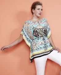 An on-trend scarf print invigorates Style&co.'s batwing sleeve plus size top, cinched by a drawstring waist-- pair it with neutral bottoms for a chic look.