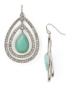Dress up your days and nights in richly hued, radiant accessories. Earrings by Aqua.