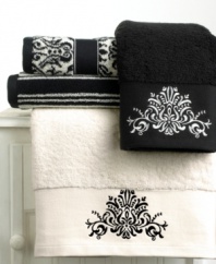 These dramatic towels are ornately designed after the classical beauty of Florentine art. The solid towel has  contrast floral embroidery on a wide dobby border, while the firenze towel is bold with a floral pattern on a contrast ground. Black and white firenze stripes adorn the third towel.