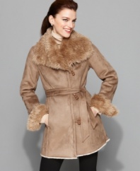 Look fashionable and stay warm from morning to night in this faux shearling coat from Jones New York. (Clearance)