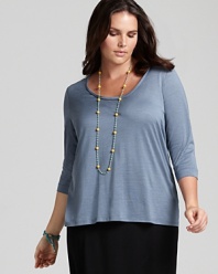 A classic scoop neck flatters the décolleté in this Eileen Fisher basic three-quarter sleeve tee--a must-have for seasonal layering.