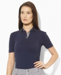 Rendered for easy, effortless movement in breathable cotton pique, the short-sleeved Lauren by Ralph Lauren polo shirt exudes modern, preppy style with bold gingham trim at the placket and collar.