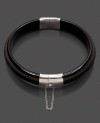 Add drama to any outfit with this smooth sterling silver onyx (10.5 x 13 mm) bangle bracelet. Approximate diameter: 2-1/2 inches.