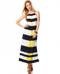 Maggy London makes a striped statement with this maxi dress, featuring a bold burst of yellow running vertically at the center of the front and back.