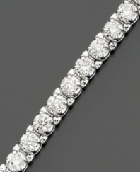 Elevated elegance. This stunning diamond bracelet features round-cut certified diamonds (7 ct. t.w.) set in luminous 14k white gold. 7 carat diamond bracelet approximate length: 7-1/4 inches.