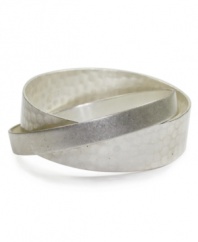 Lock in fabulous style with Jones New York's interlocked bangle. Bracelet crafted from two bands of silvertone mixed metal. Approximate diameter: 2-3/4 inches.