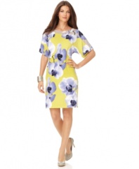 A lush floral print and spring colors make Alfani's plus size dress stand out! Try it with your favorite sandals for a fresh look.