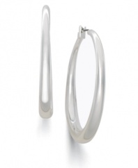 Lauren by Ralph Lauren modernized classic hoop earrings with a graduated shape. In silvertone mixed metal. Approximate diameter: 1-1/2 inches