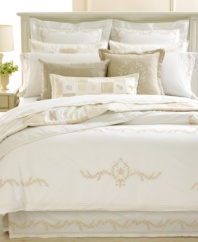 Martha Stewart Collection's Trousseau Crest embroidered pillow is the ideal accessory for your bed, featuring delicate embroidery on a creamy tan backdrop. Hidden zipper closure.