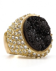 Aqua's crystal-encrusted cocktail ring adds instant attitude to your look. Wear this sparkler with a pair of must-have black leather pants to headline in rock-chic fashion.